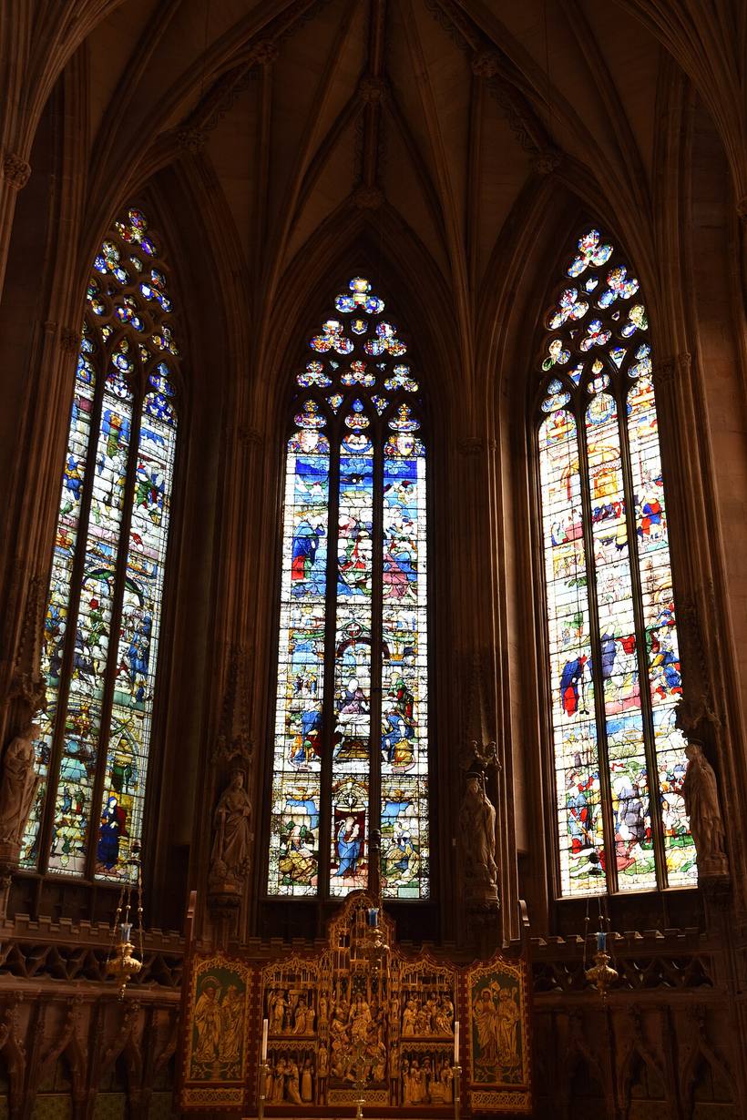 Tall windows of sixteenth-century Flemish stained glass in the Lady Chapel at Lichfield Cathedral