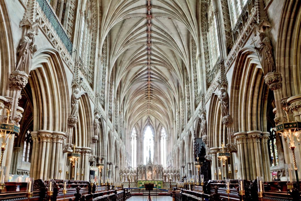 The Gothic nave of Lichfield Cathedral with clustered piers and a ribbed vault