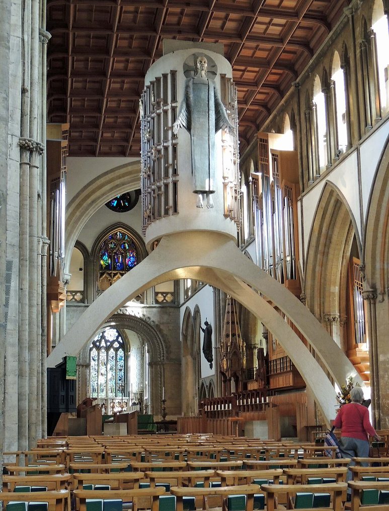 Close view of Jacob Epstein's aluminium figure of Christ in Majesty on the organ case in Llandaff Cathedral