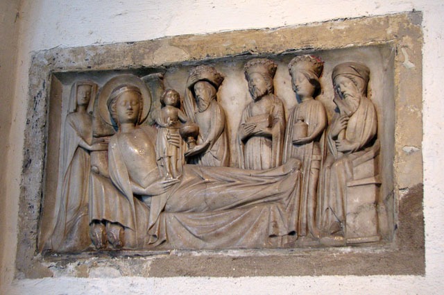 A medieval carved alabaster panel of the Adoration of the Magi at Long Melford