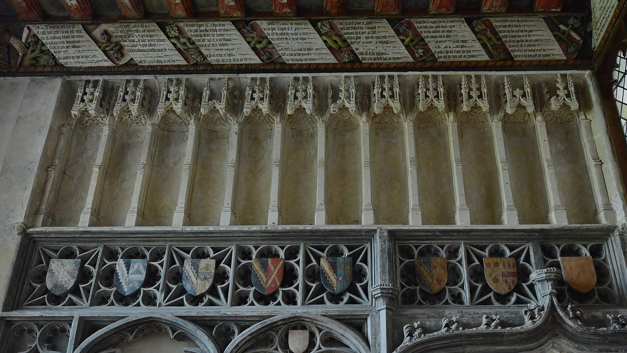 The small Clopton Chantry chapel at Long Melford with painted ceiling and inscriptions