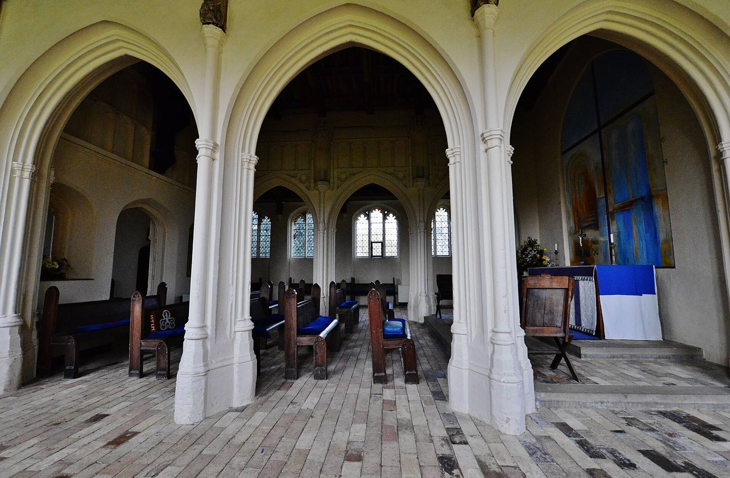 Inside the Lady Chapel at Long Melford, with a central chapel surrounded by an arcaded walkway
