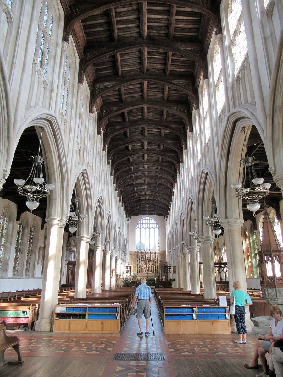 The long nave of Holy Trinity Long Melford looking east to the chancel