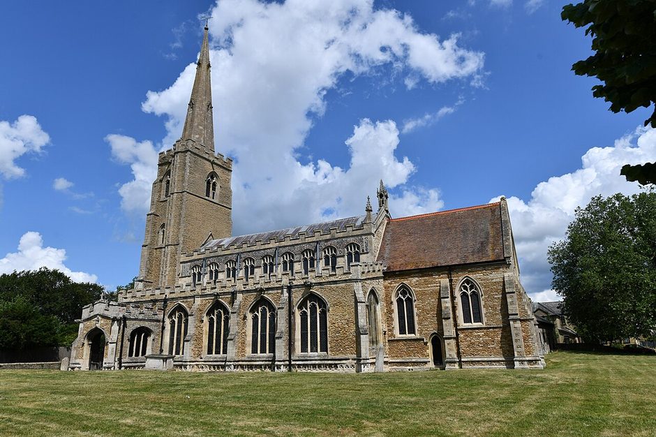 St Wendreda's Church, March, Cambridgeshire, seen from the south across the churchyard, with its west tower and spire