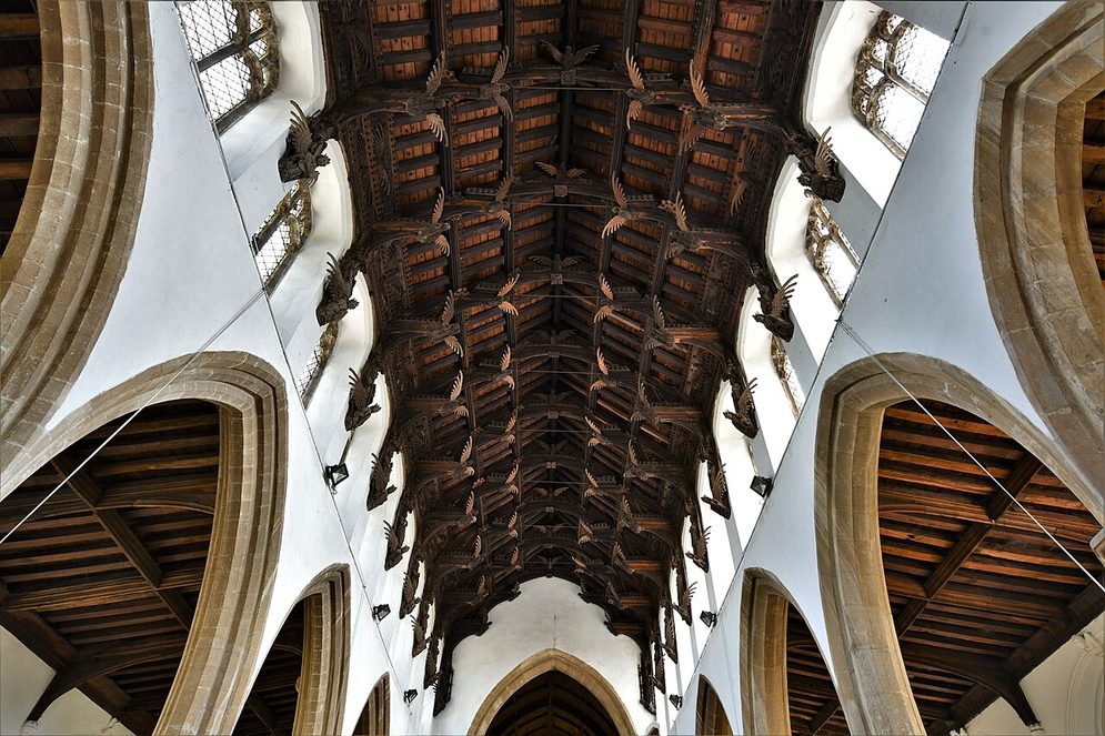 Looking along the double hammerbeam roof of St Wendreda's, March, lined with rows of carved wooden angels