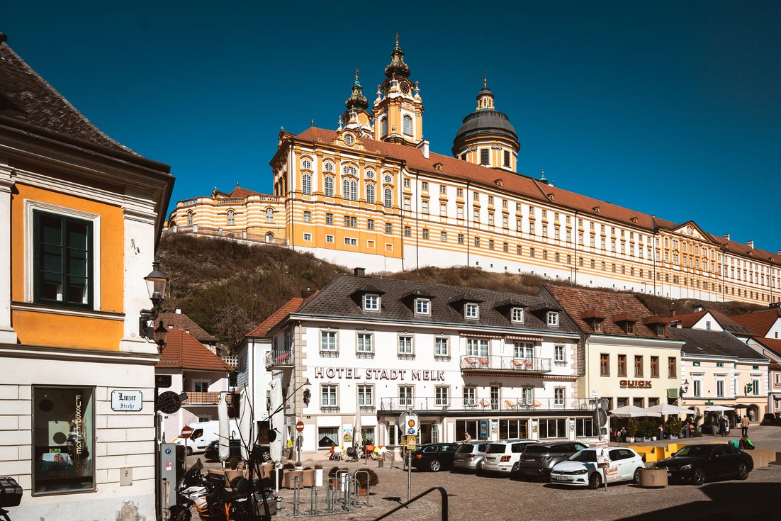 Melk Abbey seen above the rooftops and main square of the town of Melk