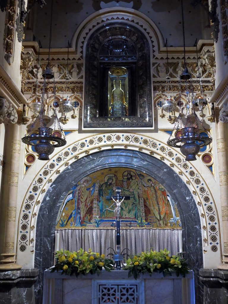 The richly decorated chapel of the Cambril behind the high altar at Montserrat, with mosaics and marble