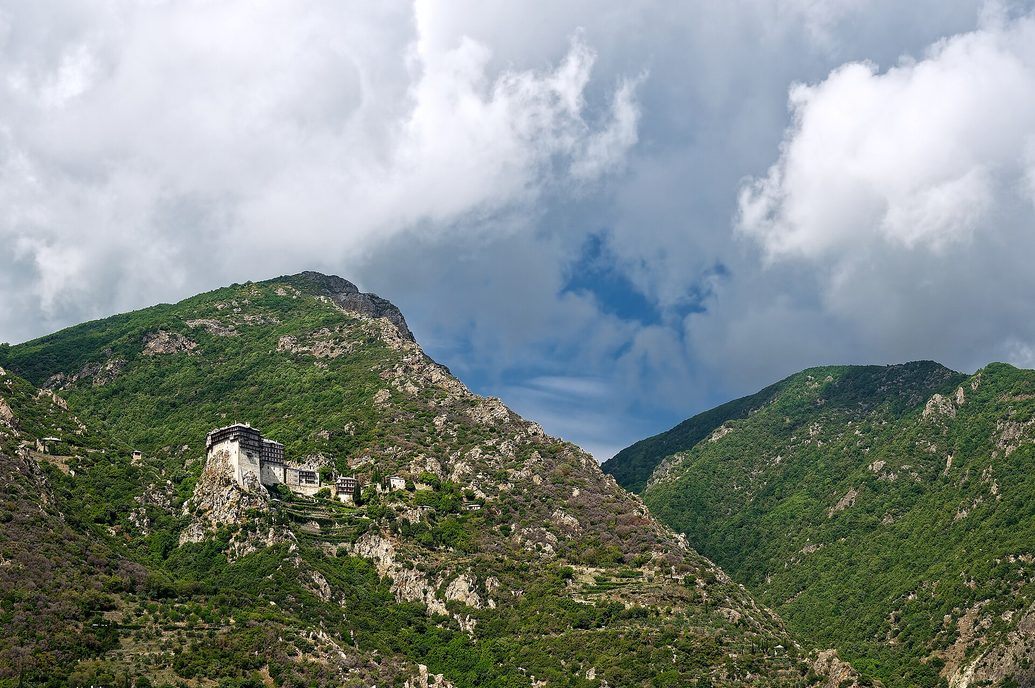 Simonopetra monastery on Mount Athos, its tall walls and wooden balconies rising from a rock high above the sea