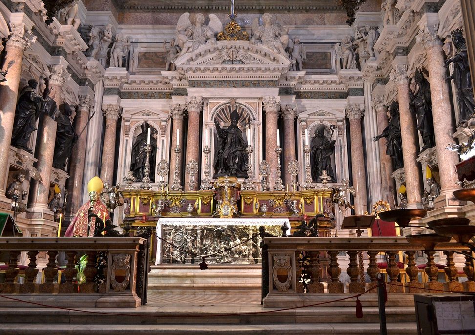 The domed Baroque Chapel of the Treasure of San Gennaro, with marble altars, silver busts and painted pendentives