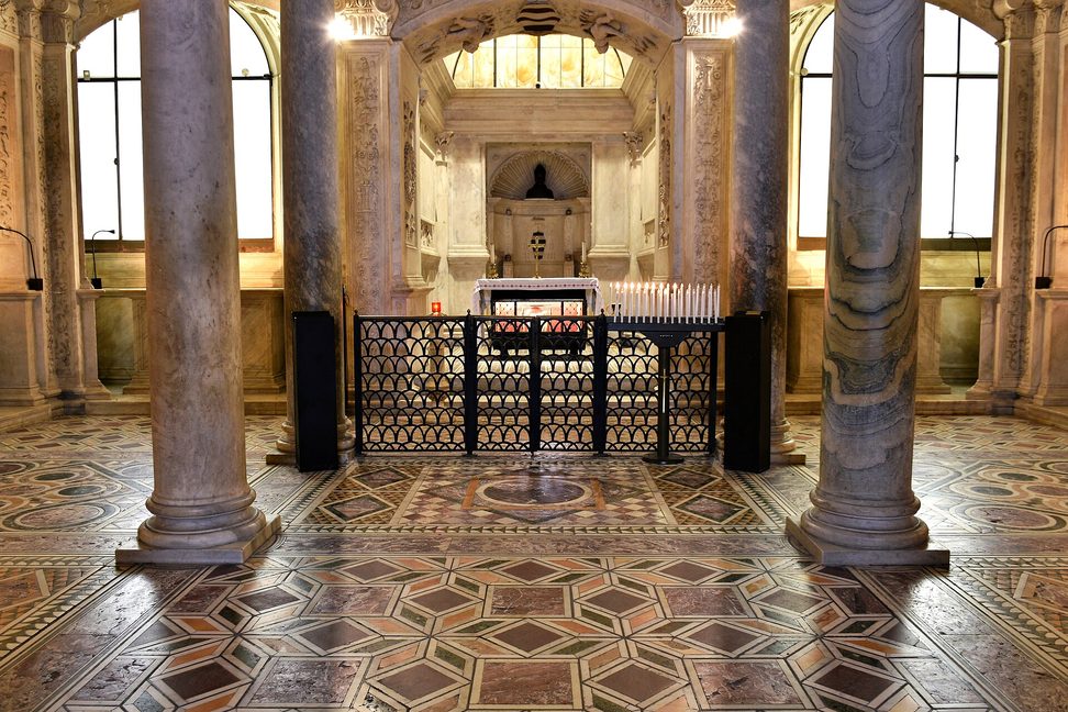 The white marble Renaissance crypt of San Gennaro under the high altar of Naples Cathedral, with carved panels and columns