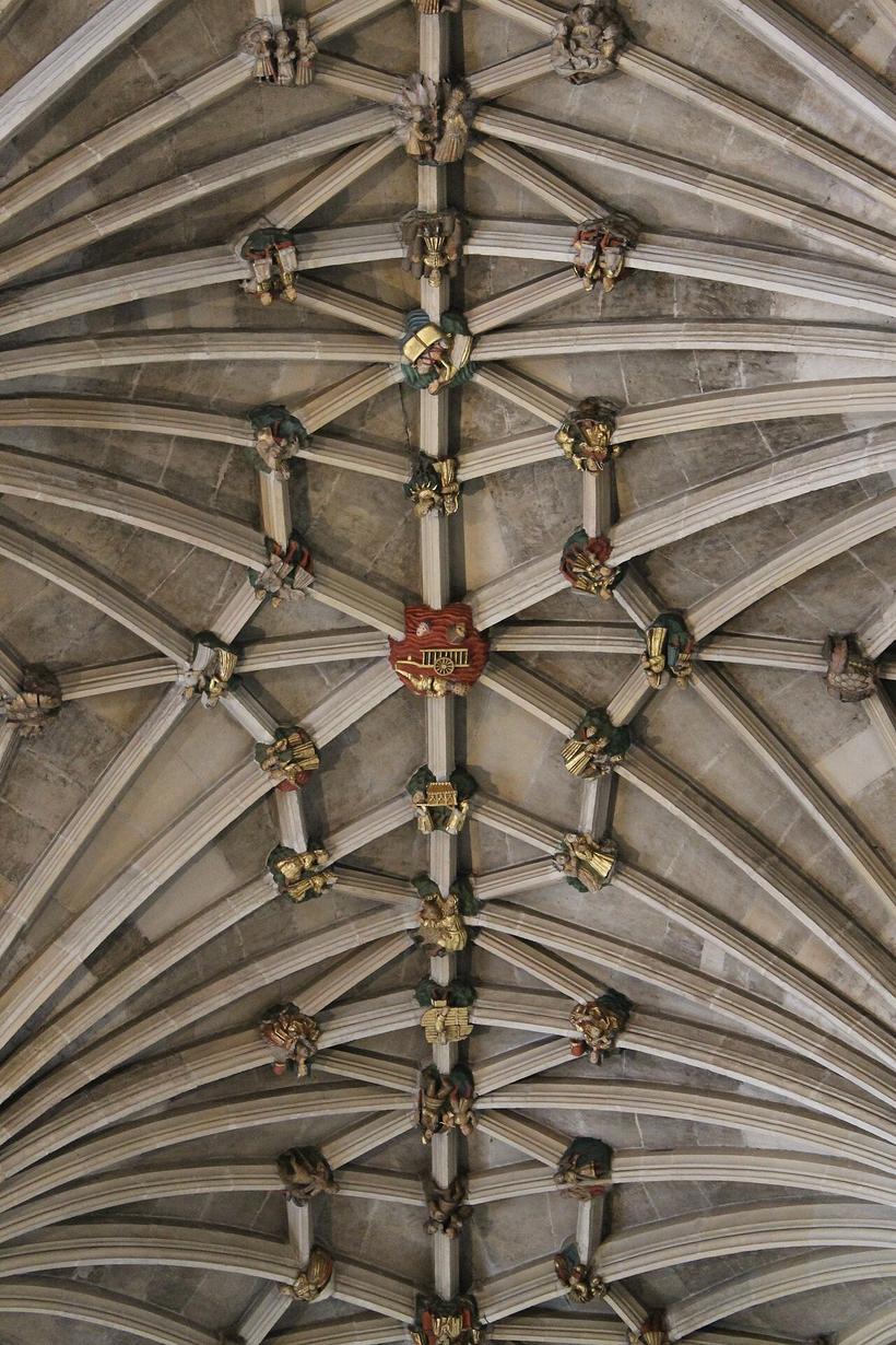 Close view of painted roof bosses in the vault of Norwich Cathedral