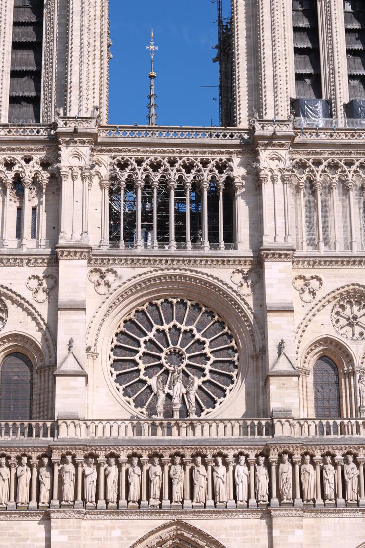 The west rose window and the Gallery of Kings on the facade of Notre-Dame de Paris