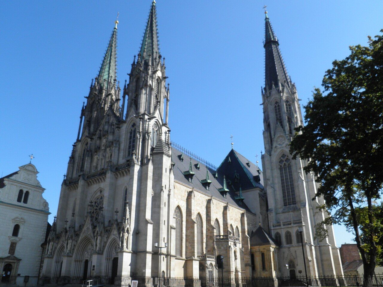 The neo-Gothic west front of St Wenceslas Cathedral in Olomouc with its two spires and the taller south tower