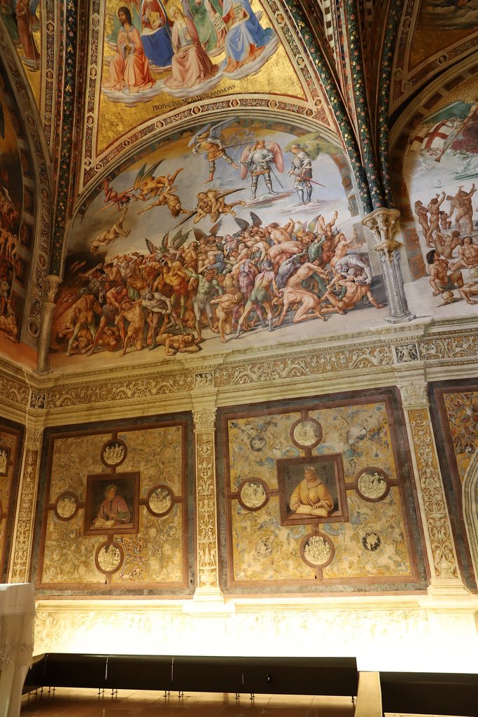 Signorelli's fresco of the Damned, a mass of naked bodies tormented by demons, in the San Brizio Chapel