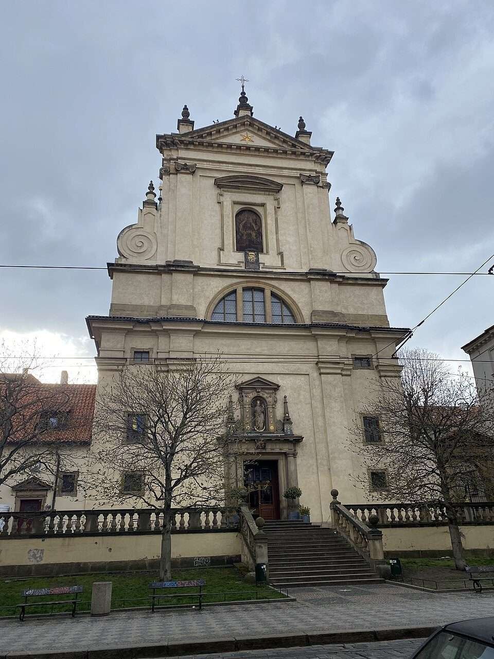 The Baroque facade of the Church of Our Lady Victorious, Prague