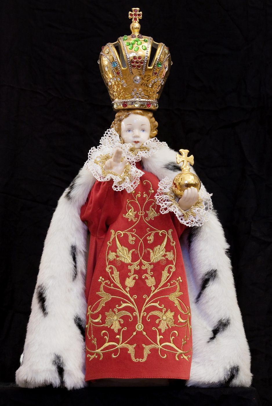 Close view of the Infant Jesus of Prague in royal robes