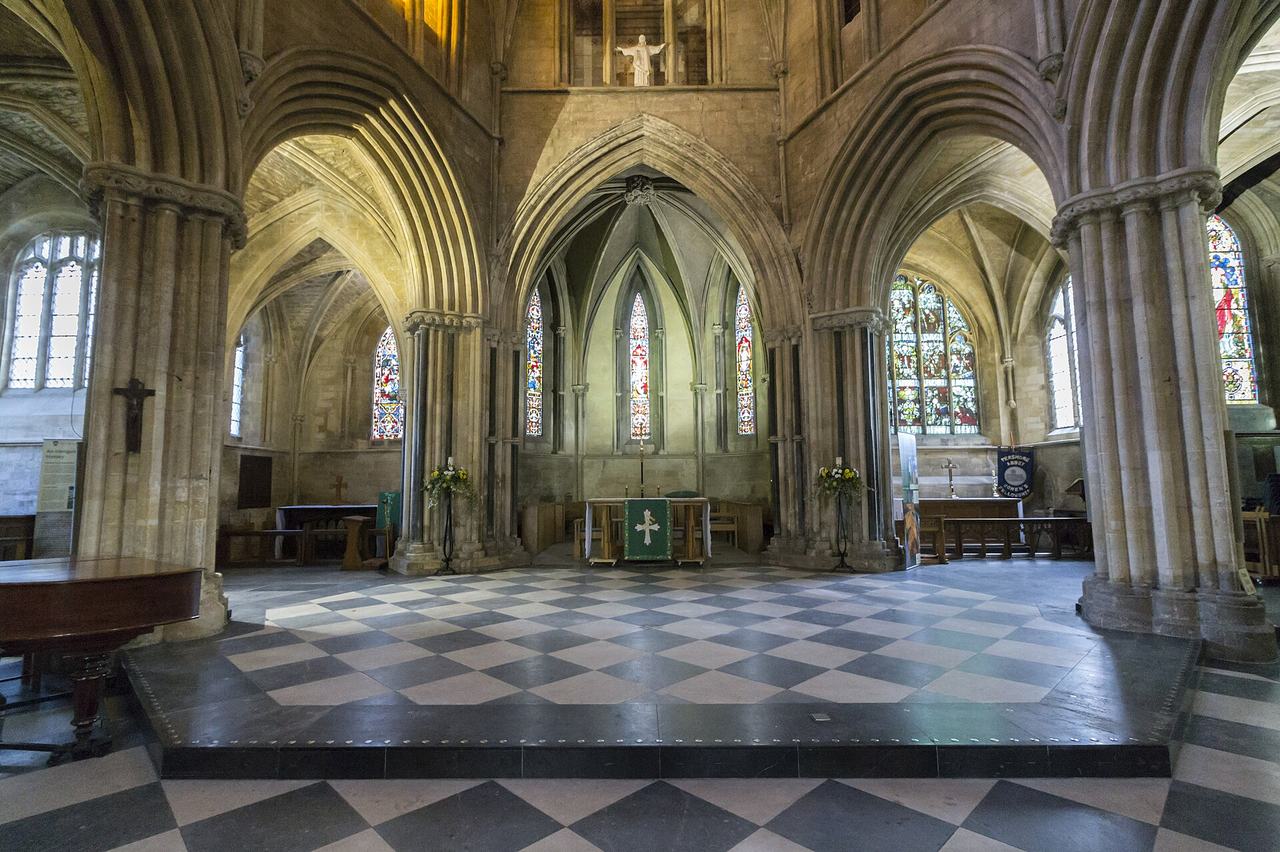 The east end of Pershore Abbey with the altar beneath tall lancet windows