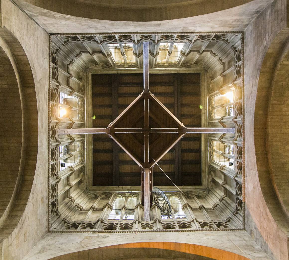Looking up inside the tower of Pershore Abbey to the suspended ringing floor