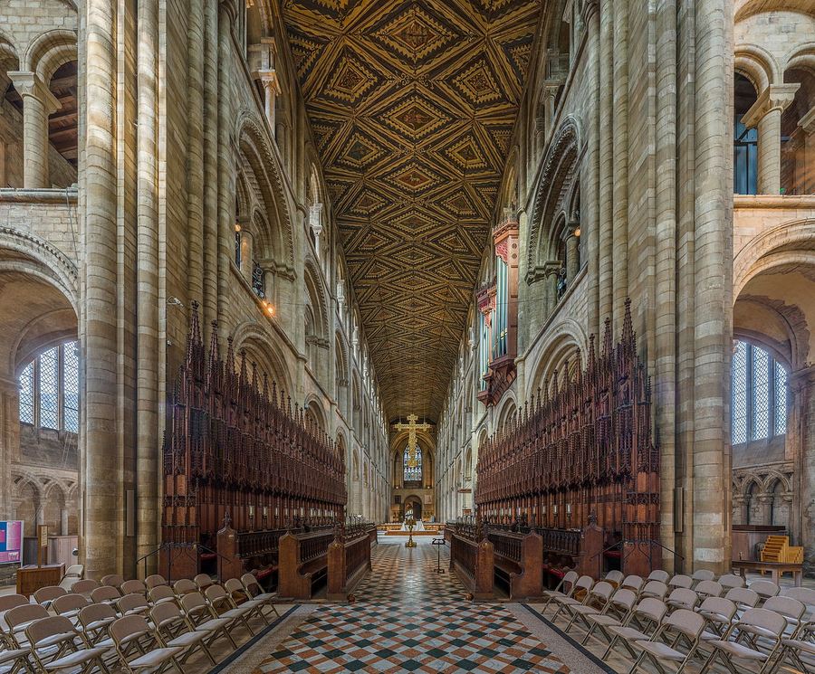 The long Norman nave of Peterborough Cathedral seen from the west end