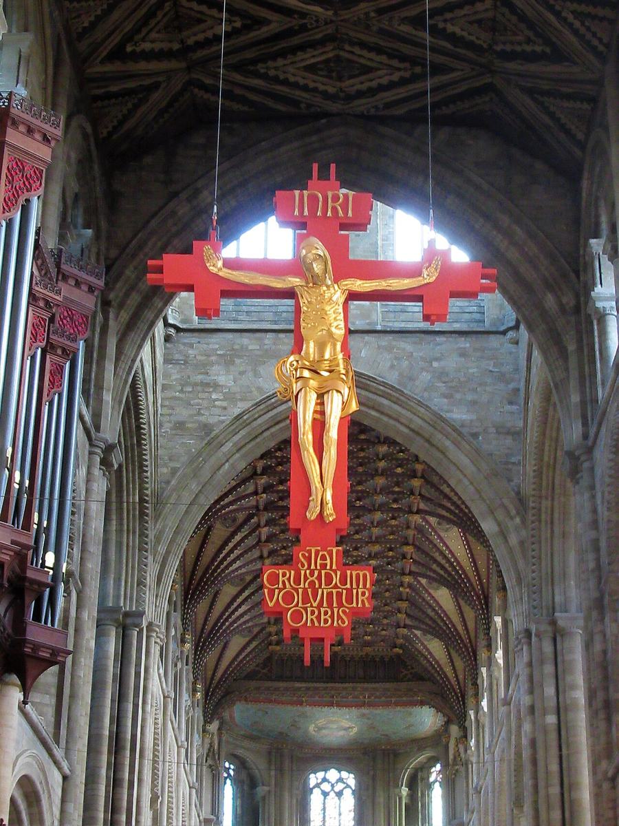 A painted hanging crucifix above the nave altar at Peterborough Cathedral
