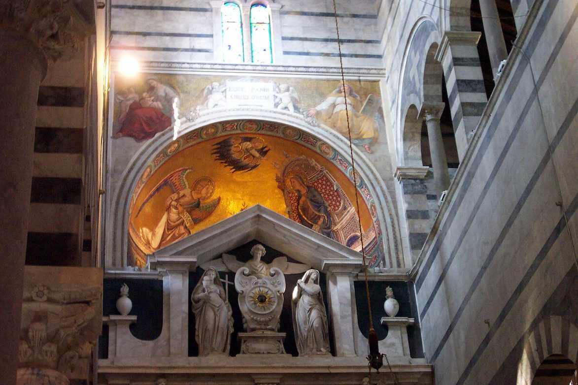 The marble tomb of Emperor Henry VII in Pisa Cathedral beneath a painted lunette