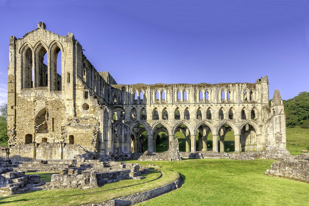 The towering three-storey arches of the ruined presbytery at Rievaulx Abbey