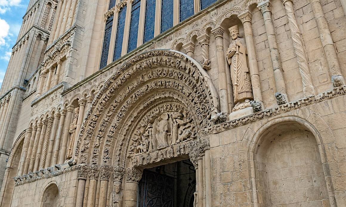 The Romanesque west doorway of Rochester Cathedral with its carved arches