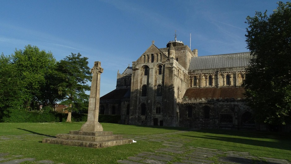 Romsey Abbey across its green churchyard