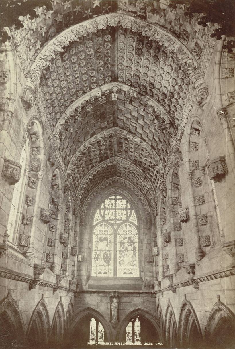 An old photograph of the carved barrel-vaulted ceiling of Rosslyn Chapel