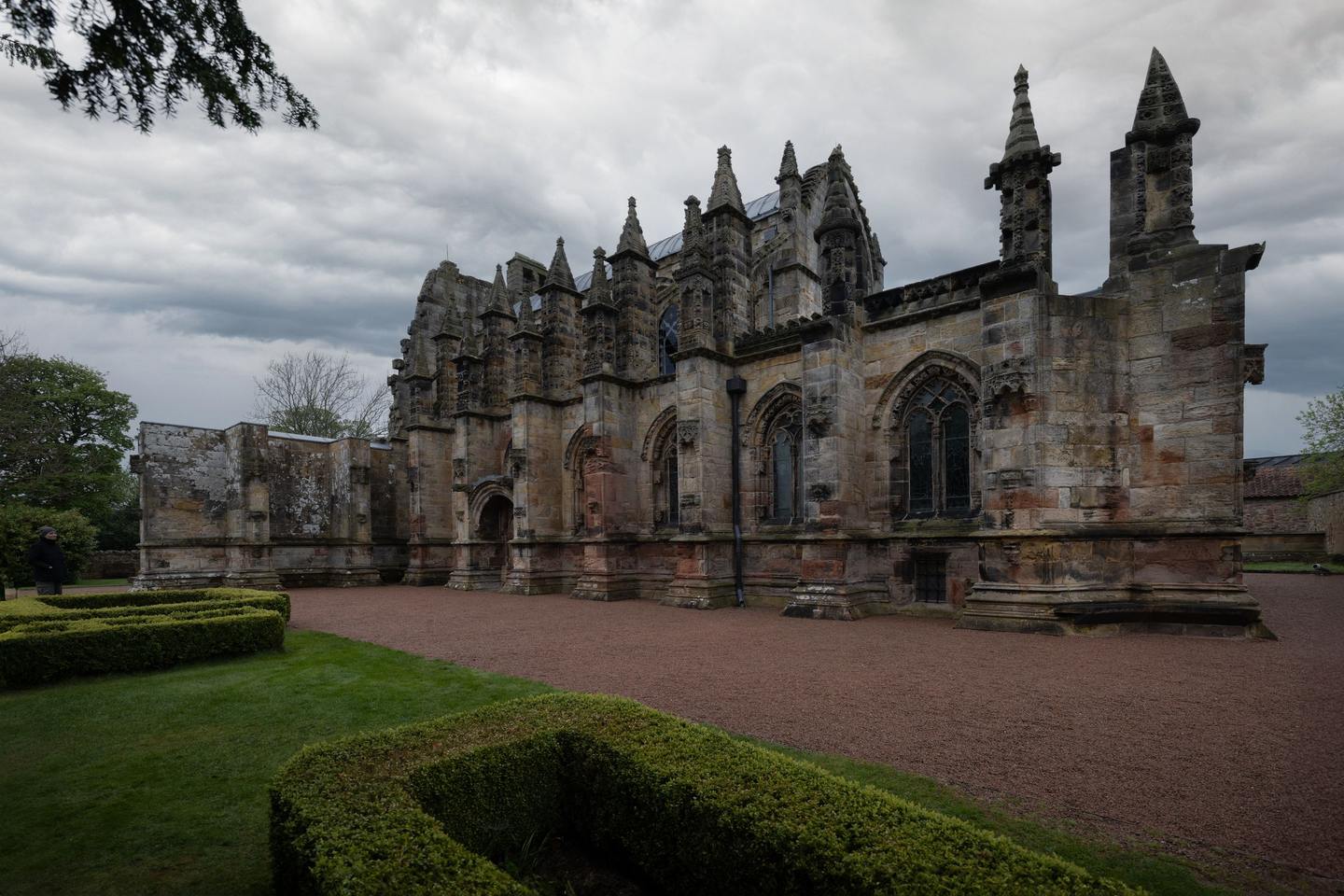 Rosslyn Chapel in Roslin, Midlothian, seen across its garden