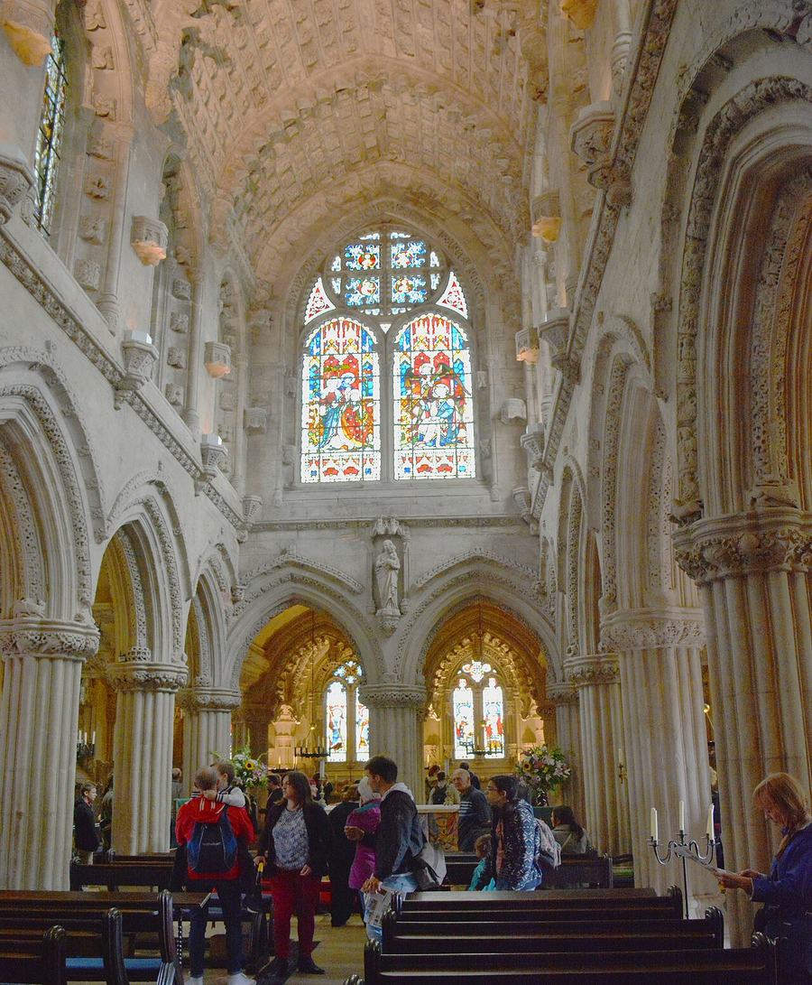 The interior of Rosslyn Chapel looking east towards the Lady Chapel and stained glass