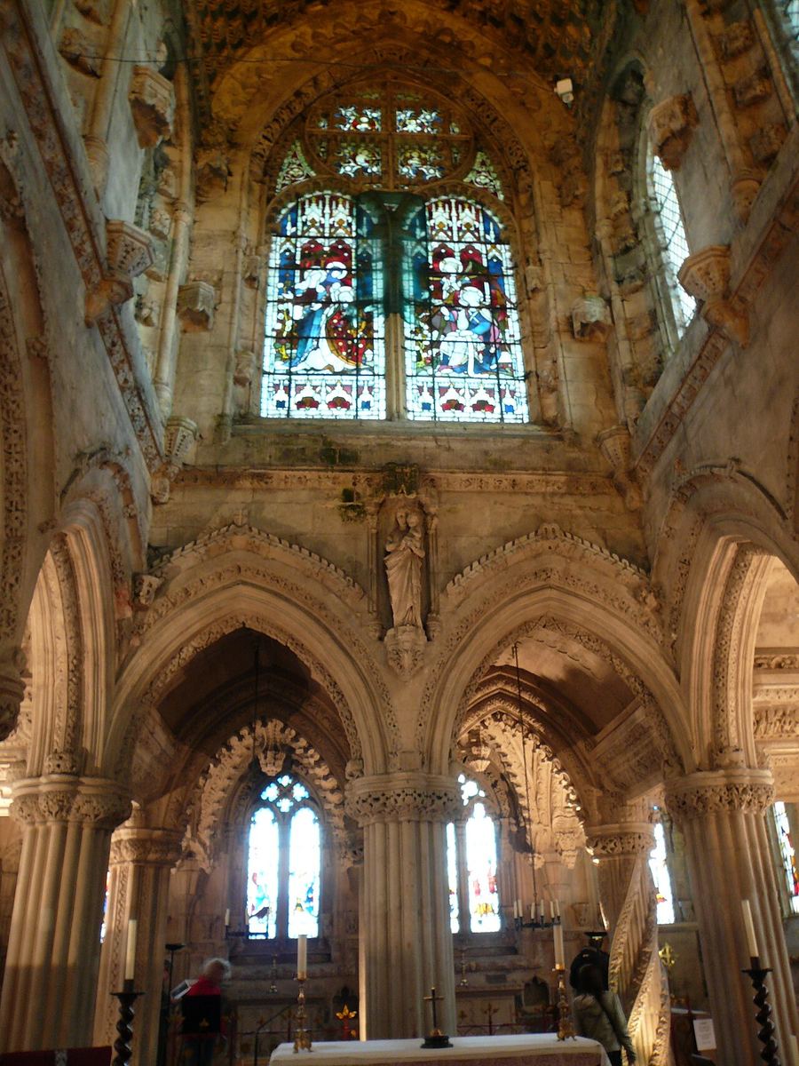 Carved arches and stained glass in the Lady Chapel of Rosslyn Chapel
