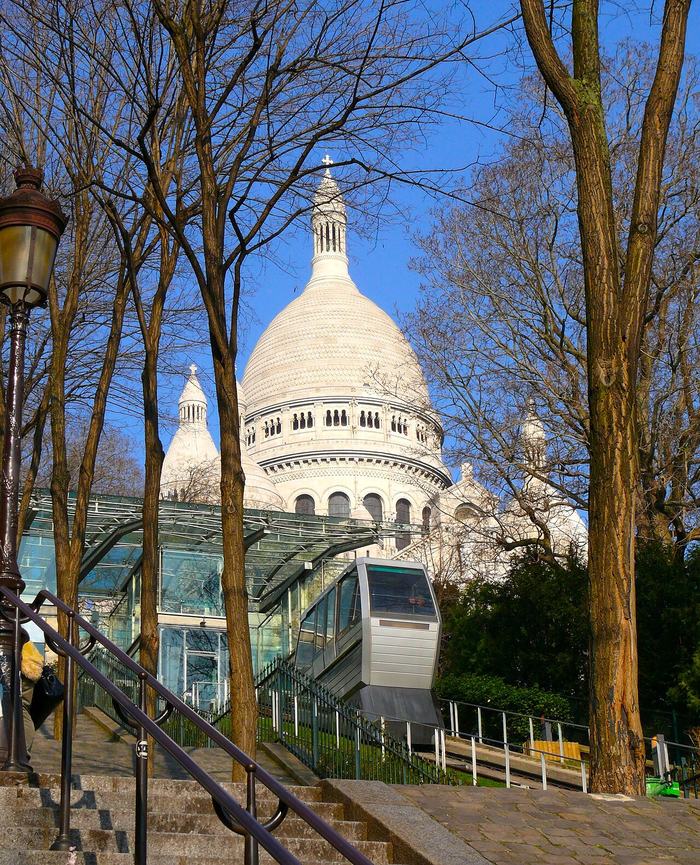 The Montmartre funicular climbing towards Sacré-Cœur through trees