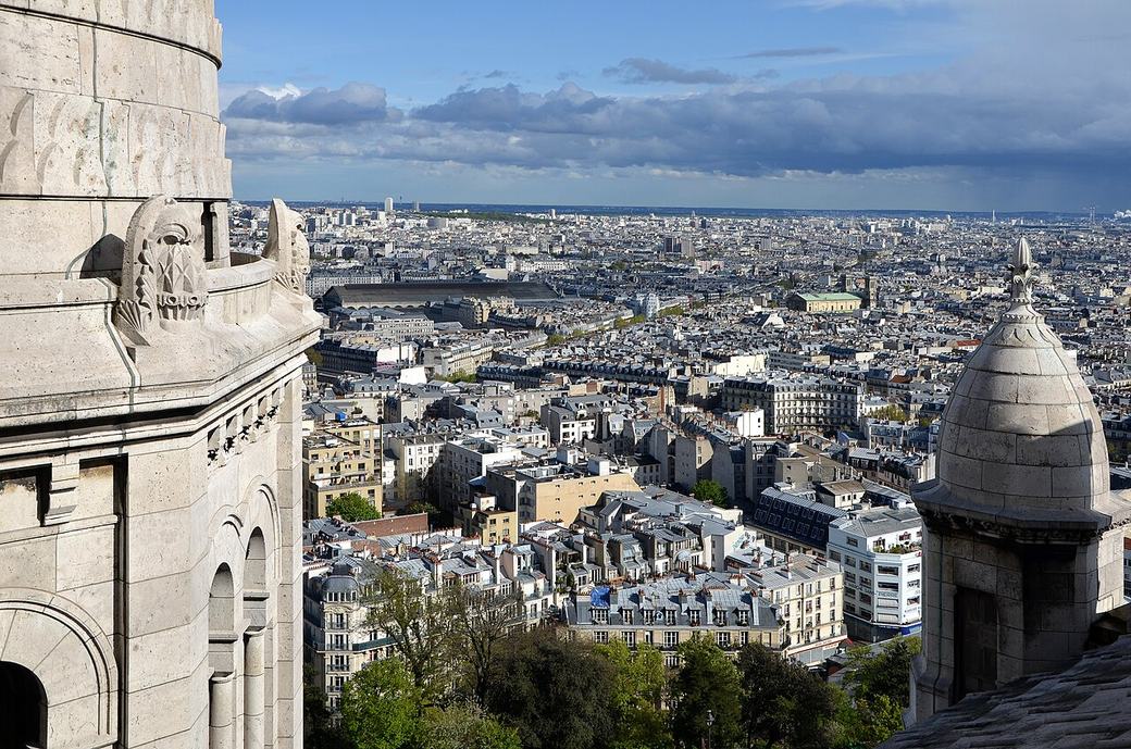 View over the roofs of Paris from the dome of Sacré-Cœur, with a small cupola in the foreground