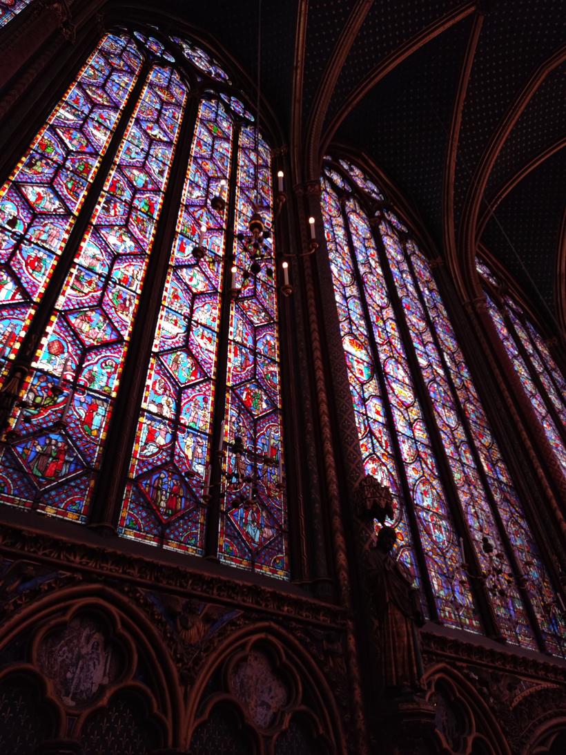 Close view of the tall stained-glass windows of the Sainte-Chapelle