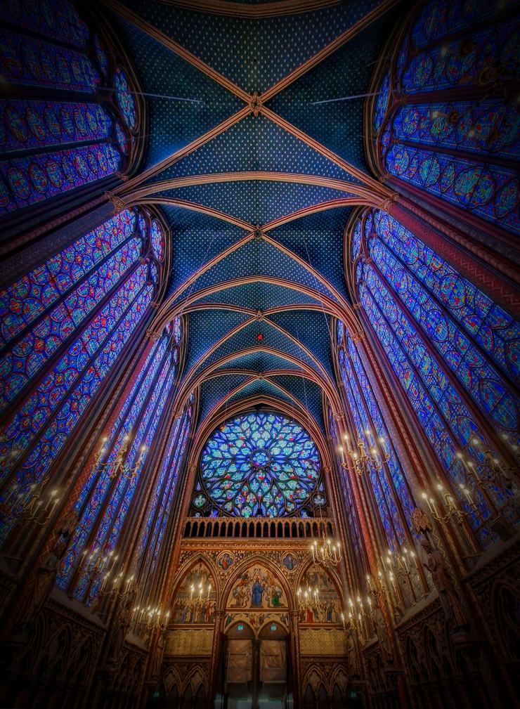The length of the upper chapel of the Sainte-Chapelle looking west to the rose window