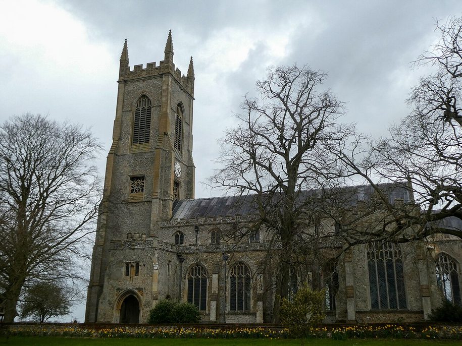The Church of St Peter and St Paul, Salle, Norfolk, a huge pale stone church with a tall west tower standing alone in open fields