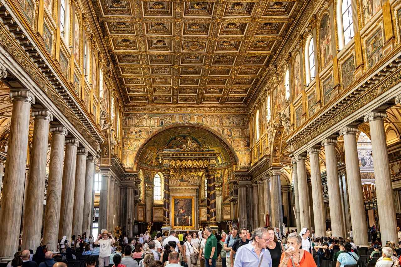The nave of Santa Maria Maggiore, lined with ancient columns and fifth-century mosaics