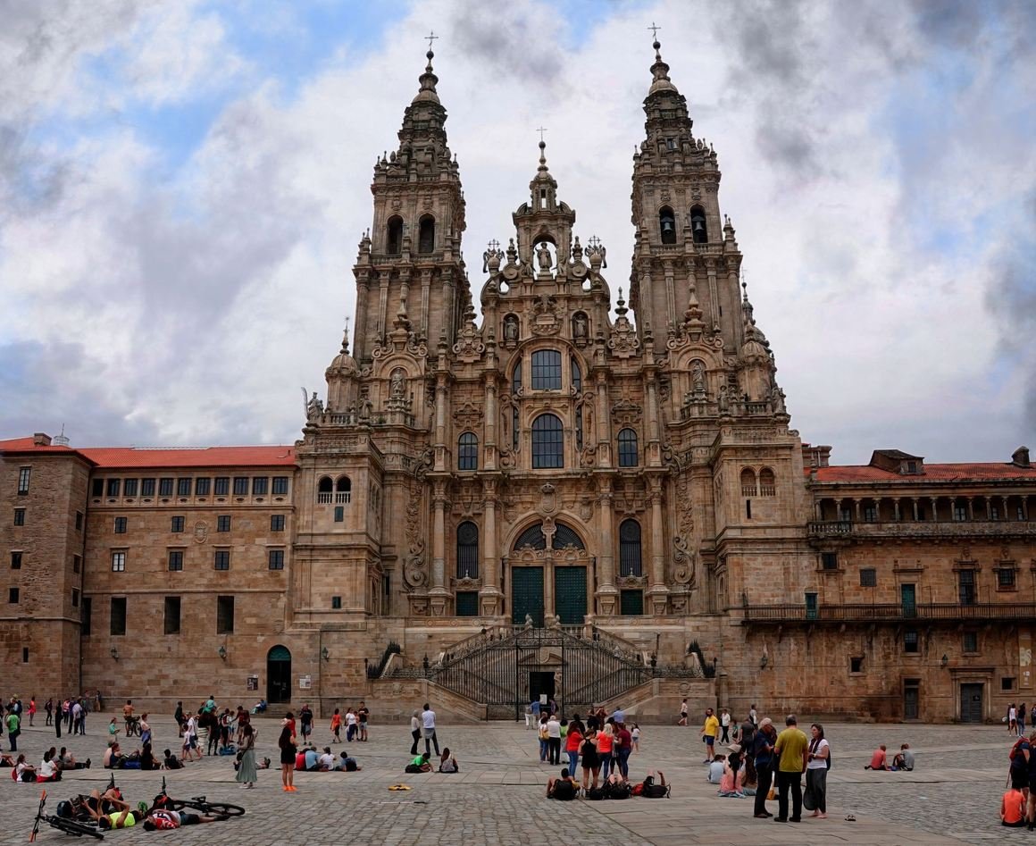 Pilgrims in the Praza do Obradoiro in front of Santiago de Compostela Cathedral