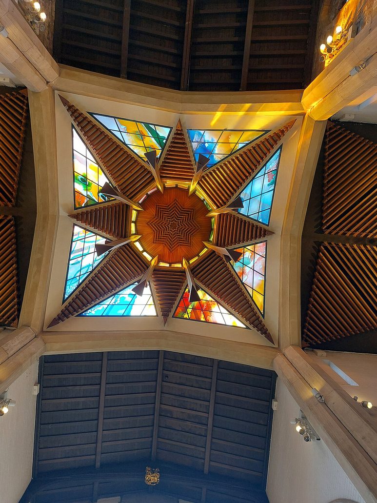 Looking up into the lantern of Sheffield Cathedral, where Amber Hiscott's glass forms a many-pointed star of colour