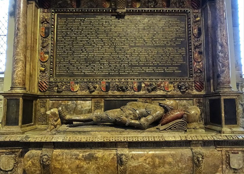 The wall monument of the 6th Earl of Shrewsbury in Sheffield Cathedral, his effigy in armour lying below a long inscription framed in gilded stone