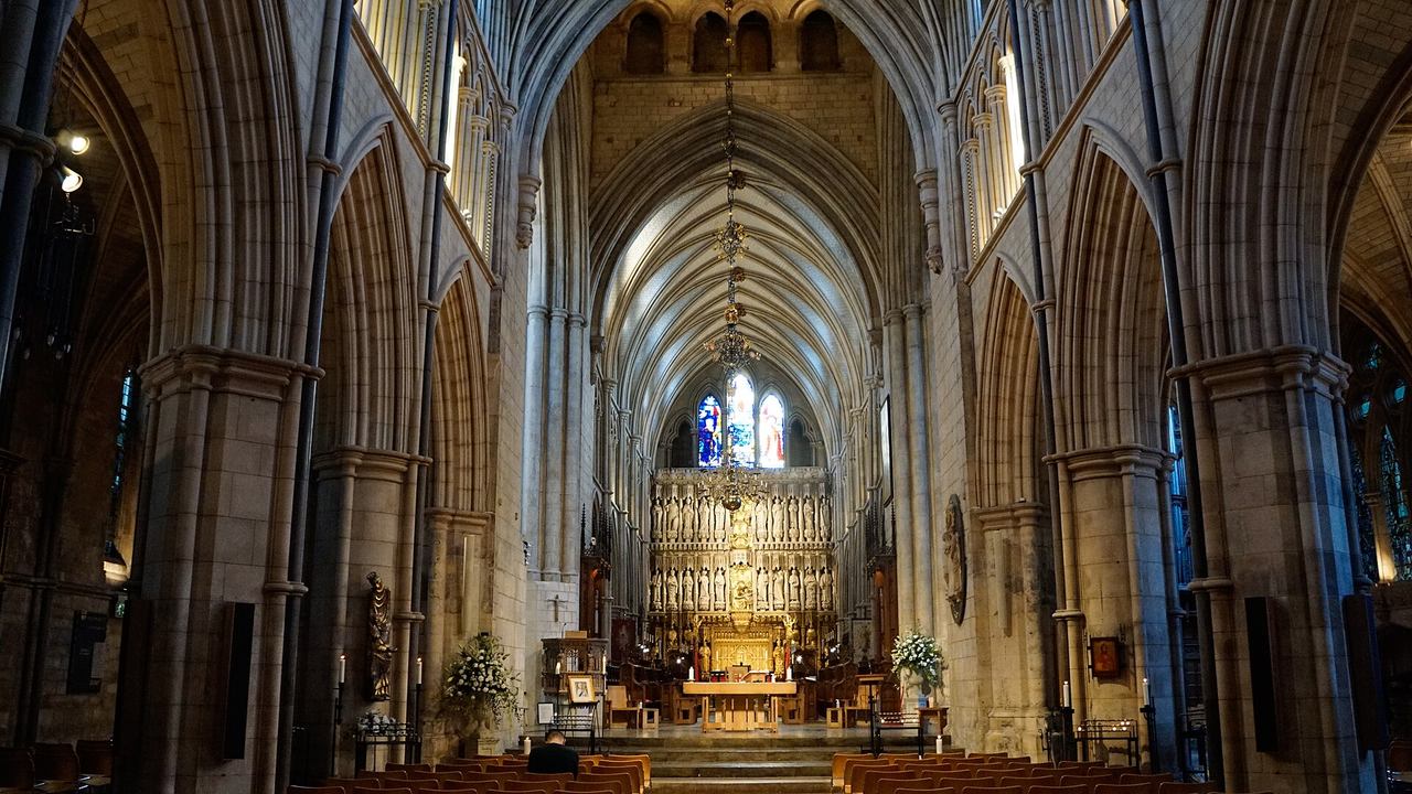 The nave of Southwark Cathedral looking east to the carved stone screen behind the high altar