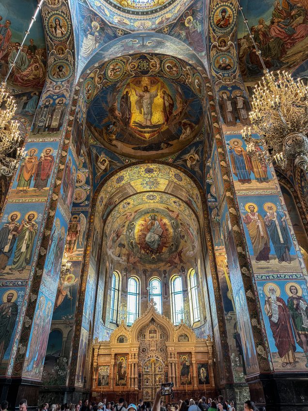 The interior of the Church of the Savior on Spilled Blood, every wall and vault covered in coloured mosaics