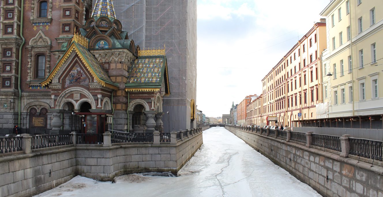 The Church of the Savior on Spilled Blood in winter, beyond the frozen, snow-covered canal