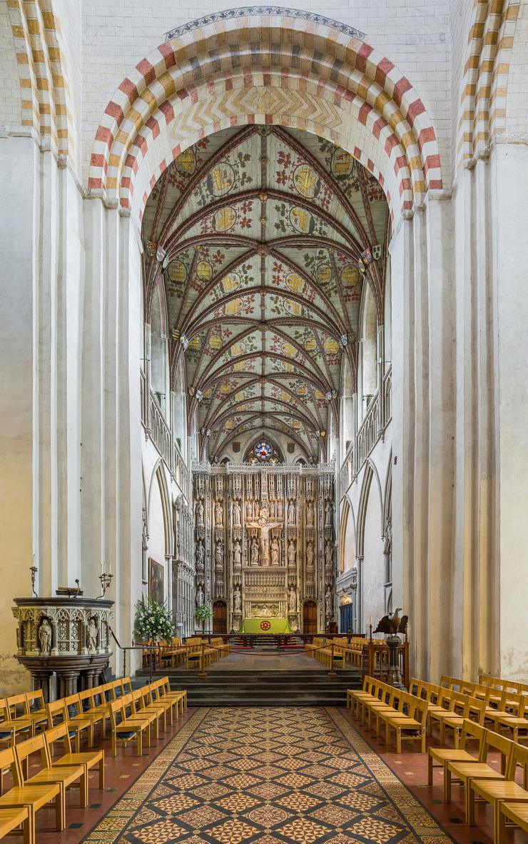The tall stone Wallingford Screen behind the high altar of St Albans Cathedral, filled with statues