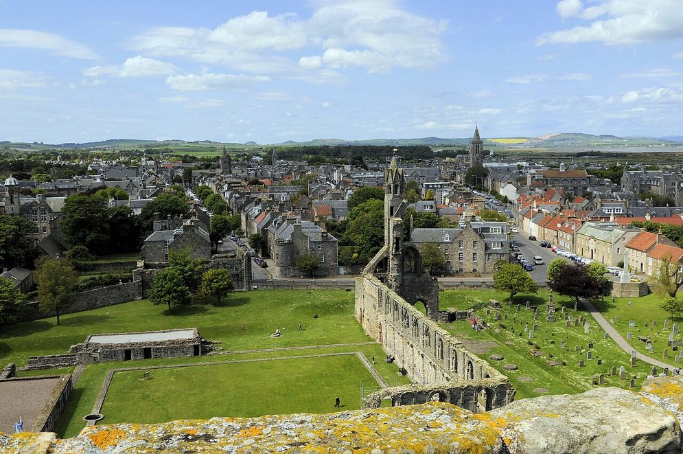 View from the top of St Rule's Tower over the cathedral ruins and the rooftops of St Andrews