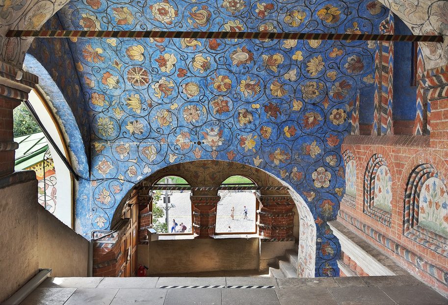 The painted gallery inside St Basil's Cathedral, its walls and vaults covered with floral ornament