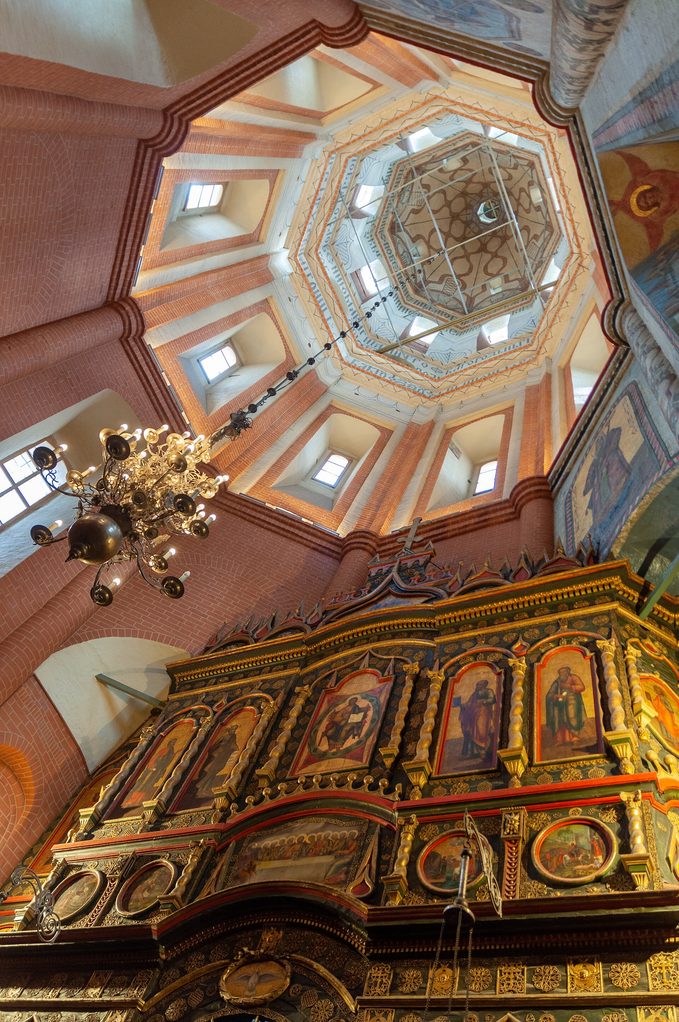 Looking up into the tall tent-shaped tower of the central Church of the Intercession in St Basil's Cathedral