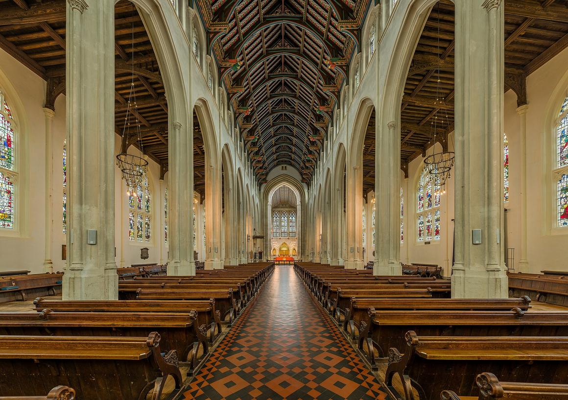 The long Perpendicular nave of St Edmundsbury Cathedral looking east, with slender piers and tall windows