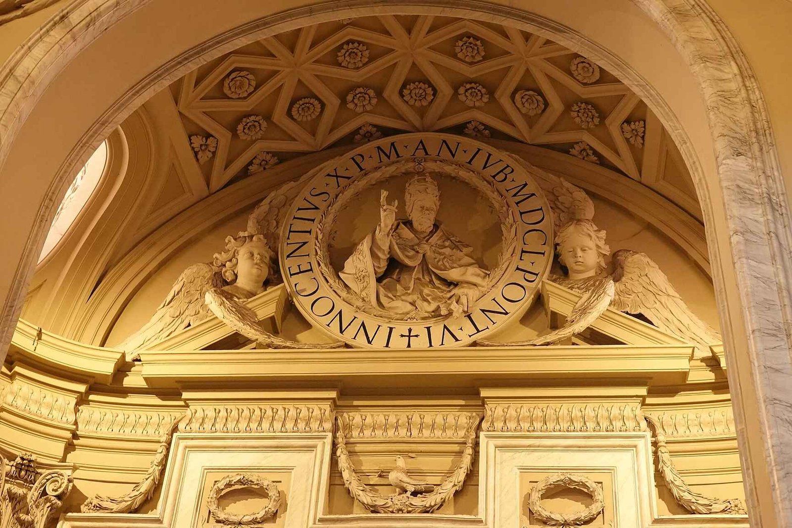 The long nave of St John Lateran, lined with colossal statues of the apostles
